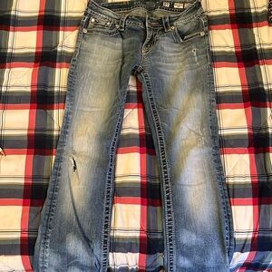 Miss Me size 27. Boot cut. Low rise. Reversibly hemmed to a size 30 length.